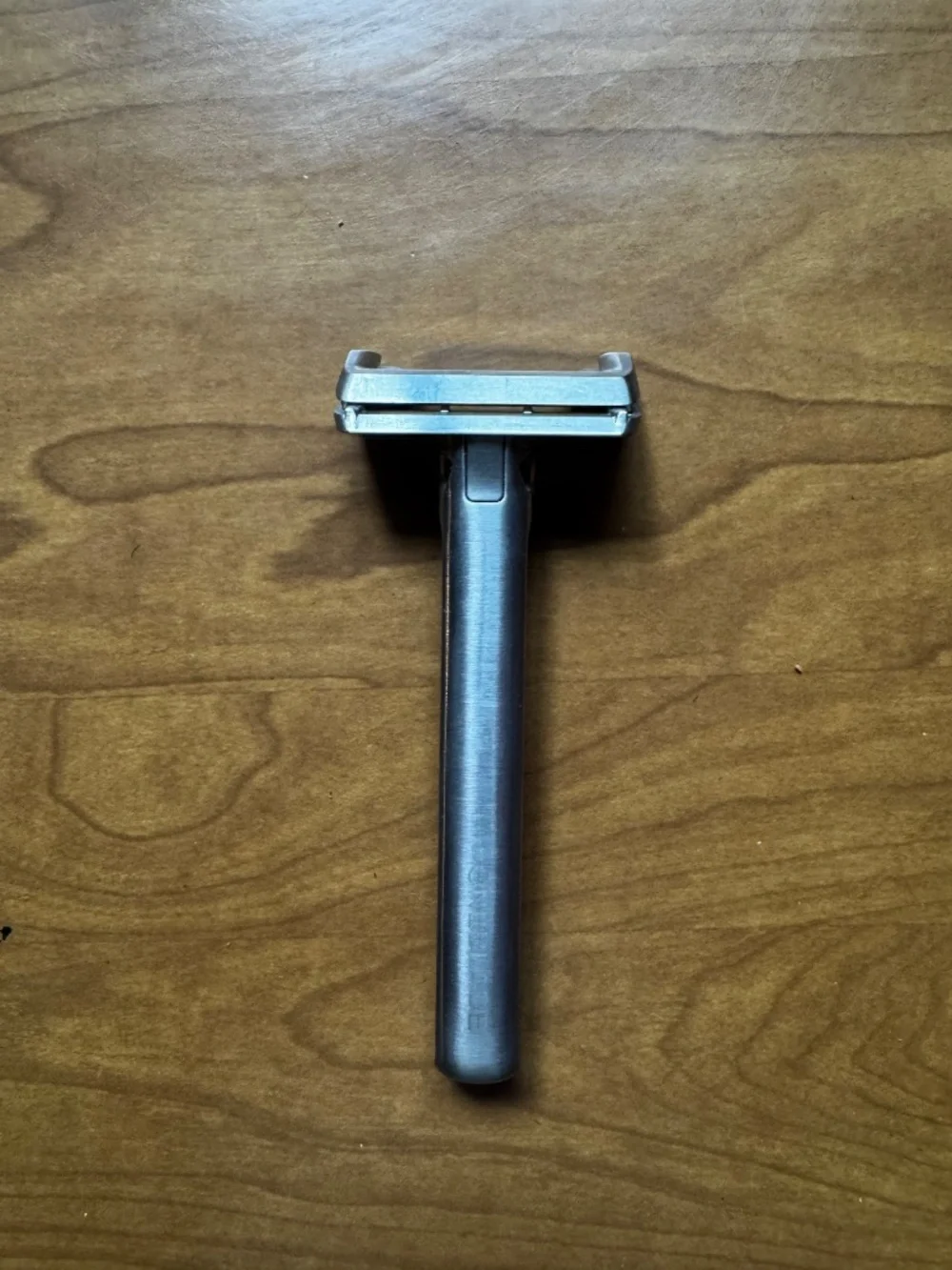 OneBlade razor with leather case, metal stand, and blades